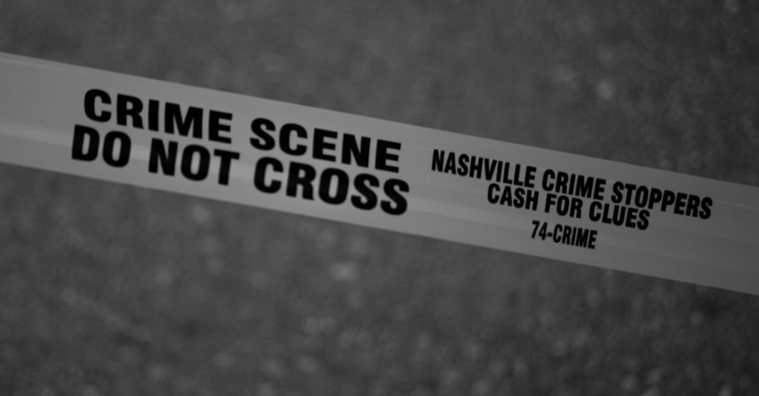 black-and-white-close-up-of-crime-scene-tape-with-nashville-text-18